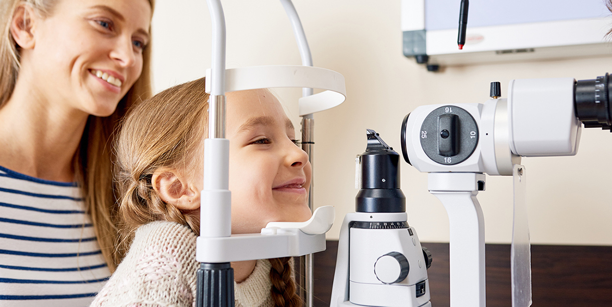 Young girl getting her eyes checked